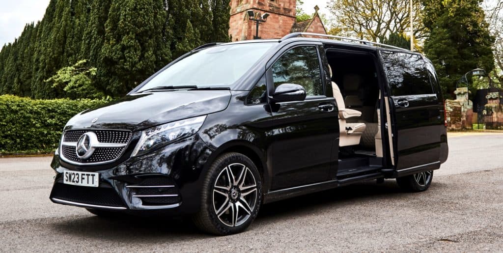Black Mercedes V-Class with the side door open, ready for a Gatwick airport transfer
