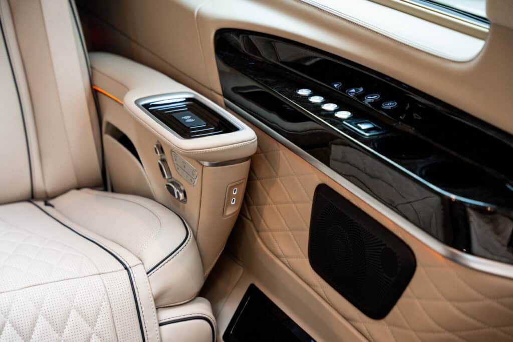 Executive rear cabin of a Swift Luxury Mercedes with climate and seat controls