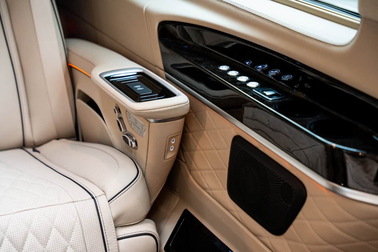 Luxury Car Interior with Advanced Controls Elegant luxury car interior with control panel and plush seating.