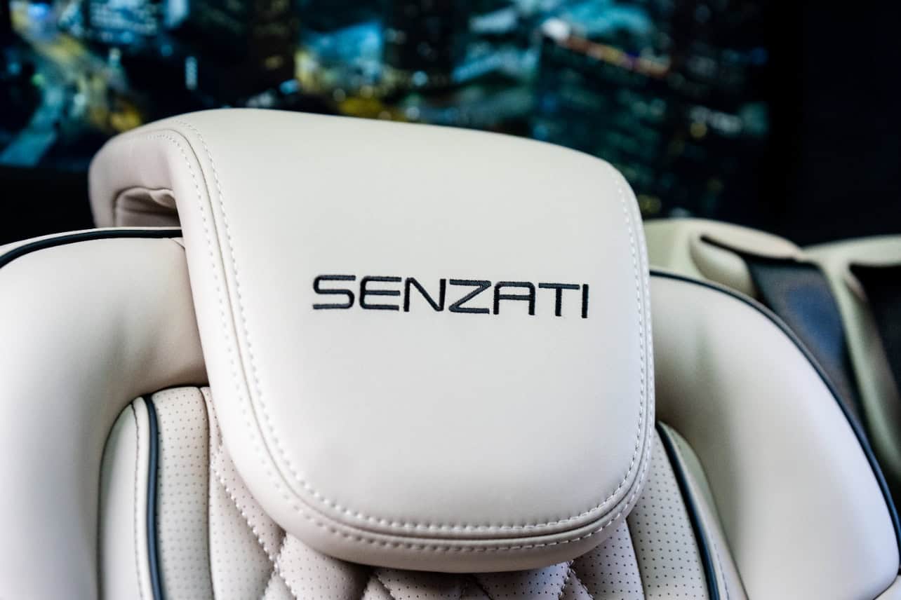 Swift Luxury Travel-39 Luxury Senzati massage chair with city skyline background.